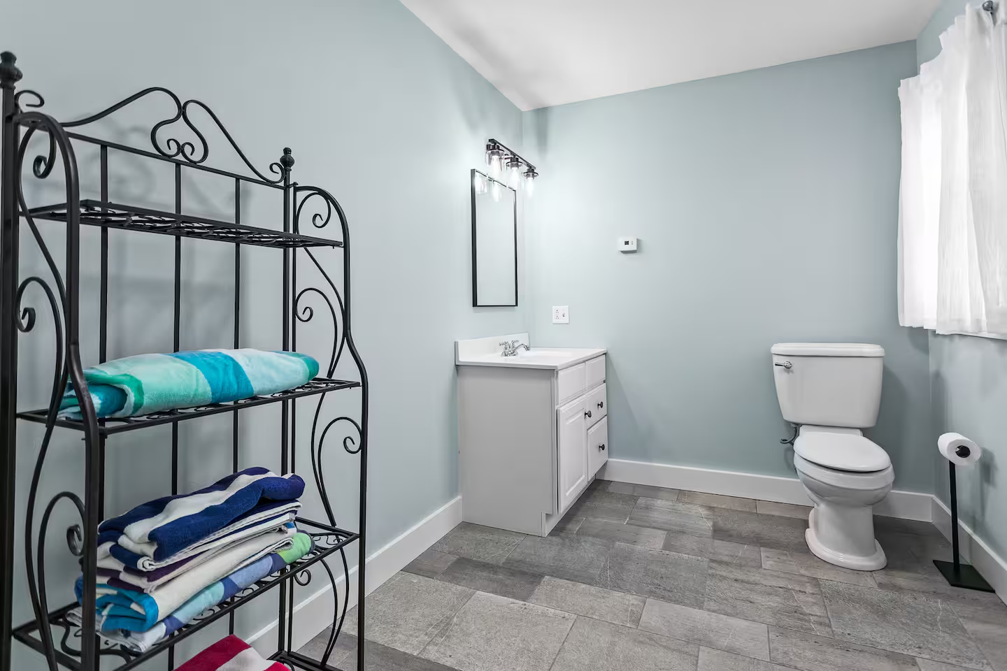 Finished bathroom with new vanity and toilet