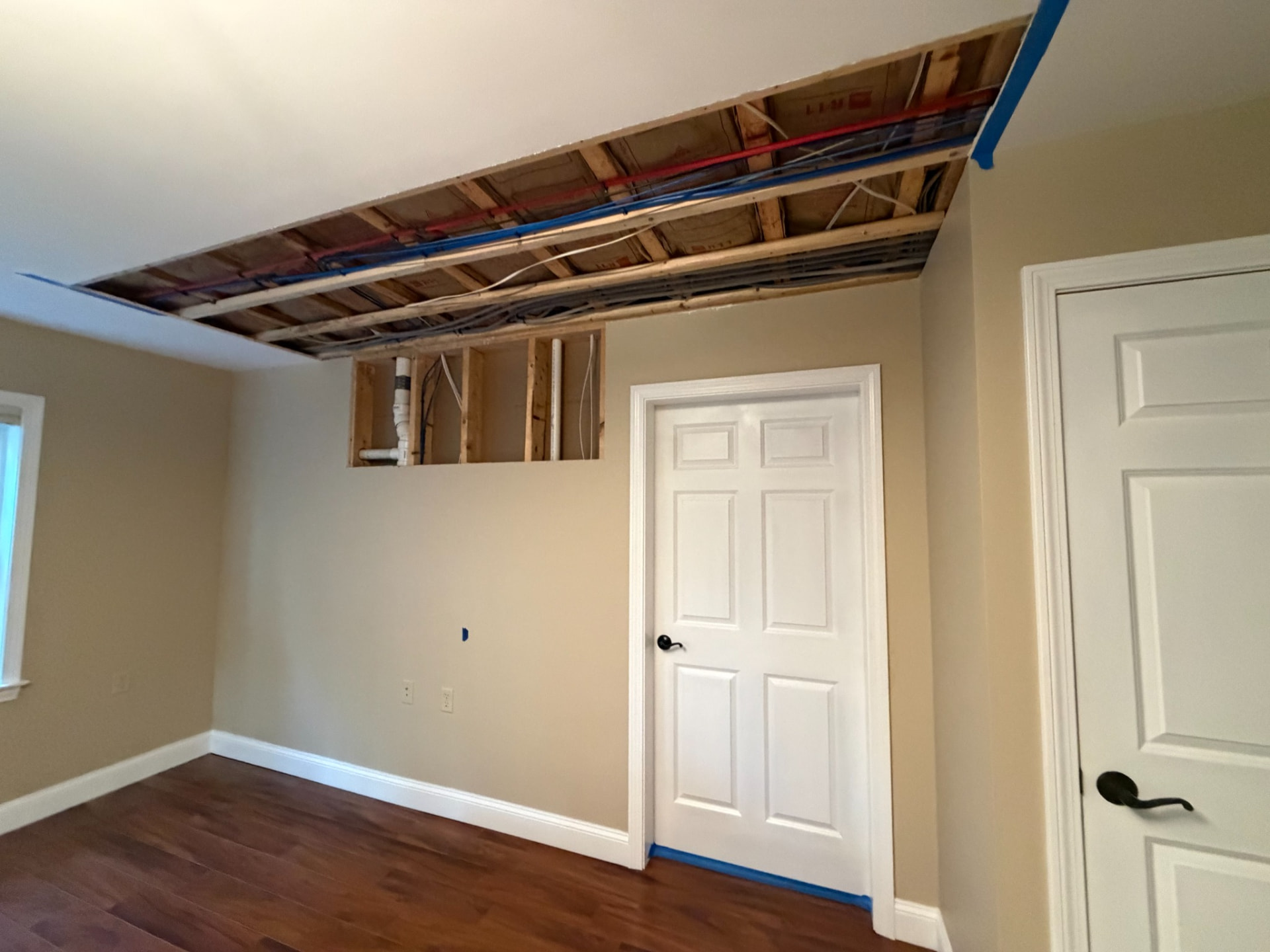 Ceiling opened for drywall repair by Hartley Home Improvement